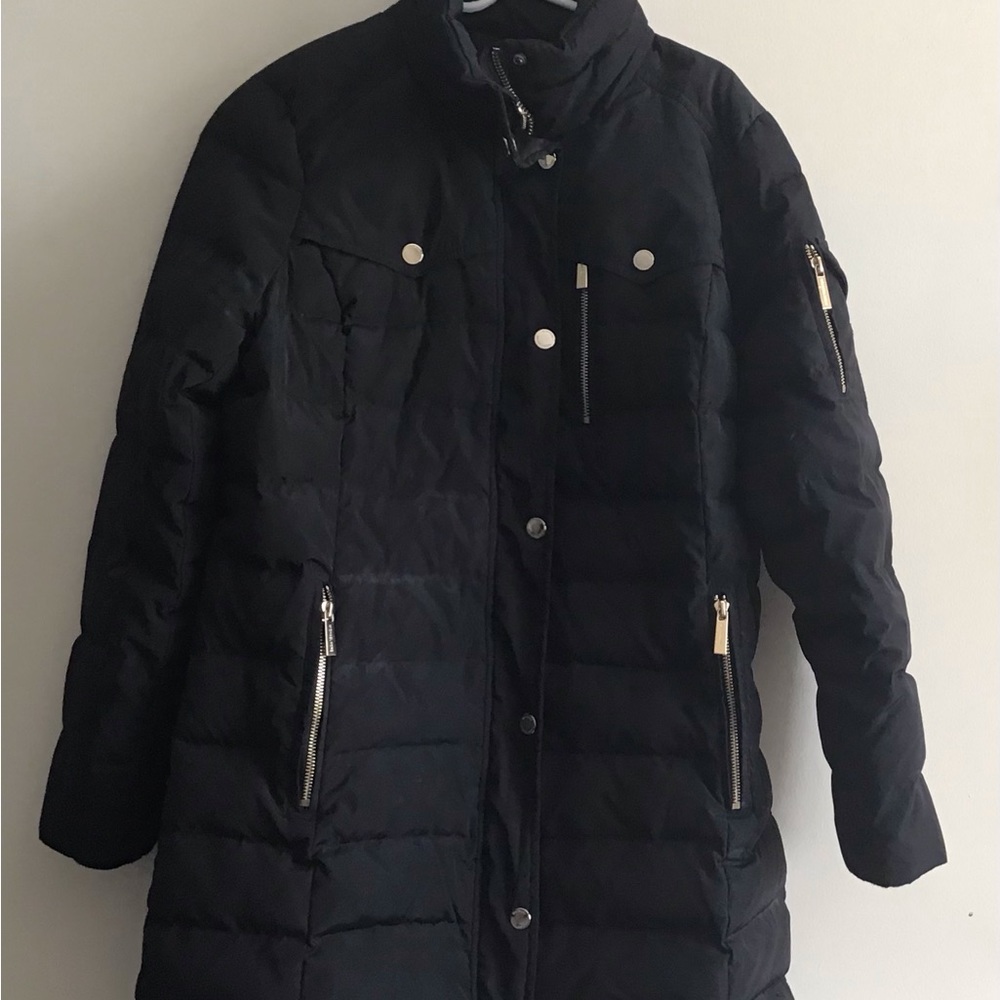 Women Winter jacket MK logo zipper pull, pocket snaps and metallic arm charm.